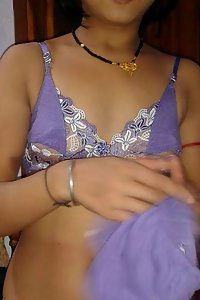 Amateur Indian wife opening her blouse to show off boobs
