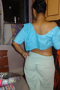 Horny Lily in blue blouse and petticoat stripping naked for fans