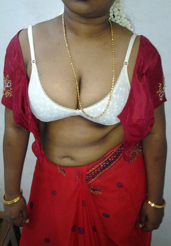 Mature Indian housewife taking her Indian outfits off in bedroom - Indian  Porn Photos